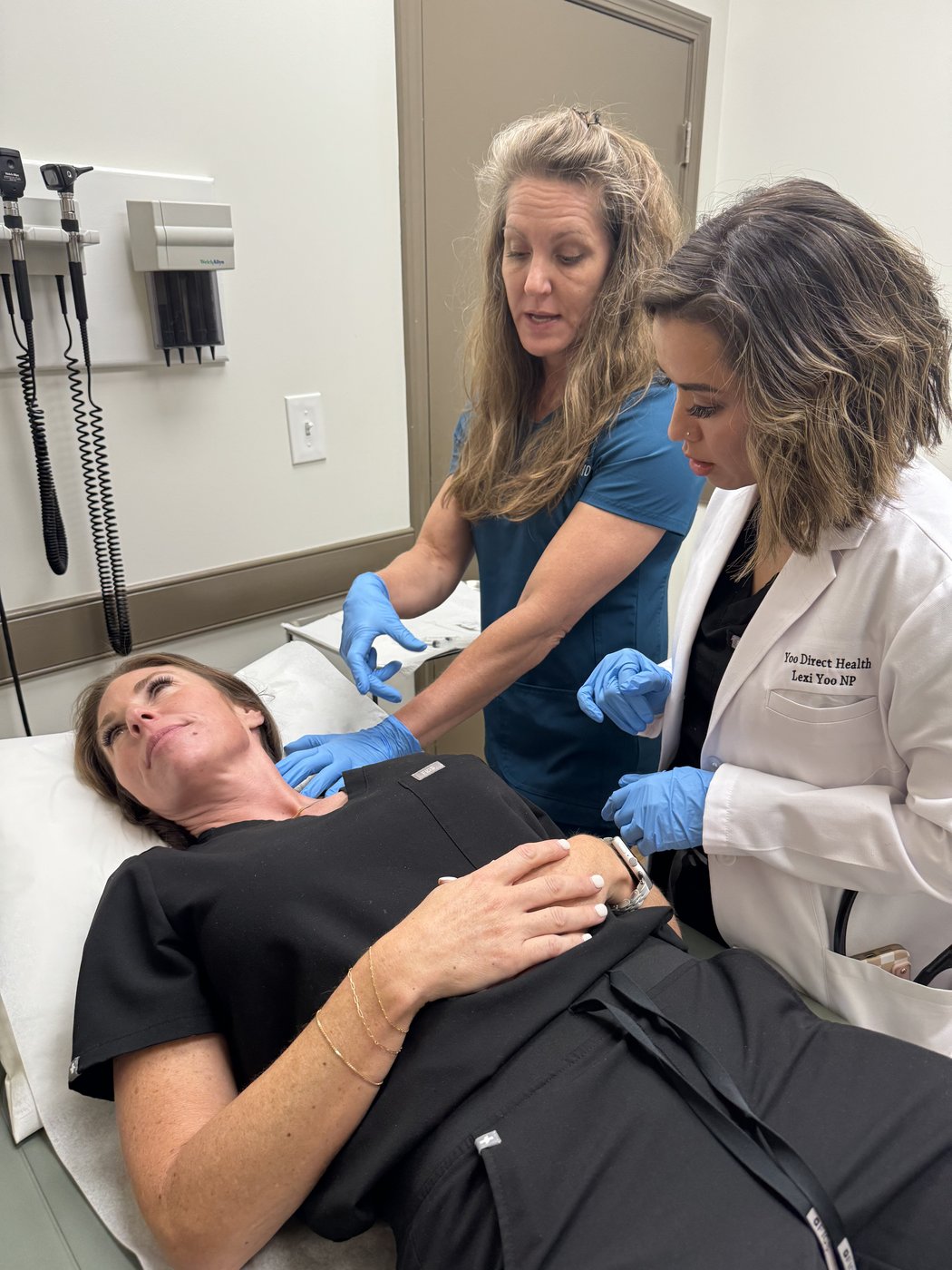 Dr. Ferree teaching Lexi Yoo a stellate ganglion block technique, hands-on